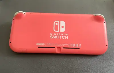 Nintendo Switch Lite coral - miniatura 3