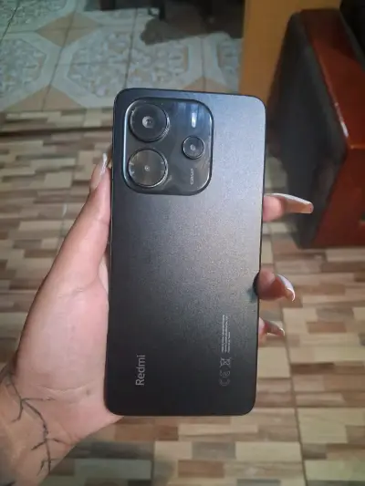 Smartphone Redmi con triple cámara trasera - miniatura 1