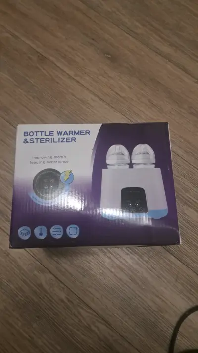 Calentador y Esterilizador de Mamaderas Eléctrico - miniatura 1