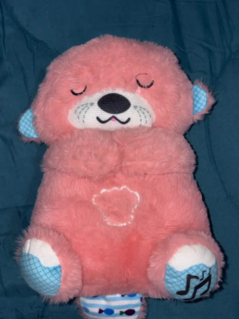 Peluche musical de oso rosado - 1