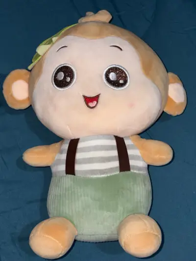 Peluche de mono con ropa a rayas - miniatura 1
