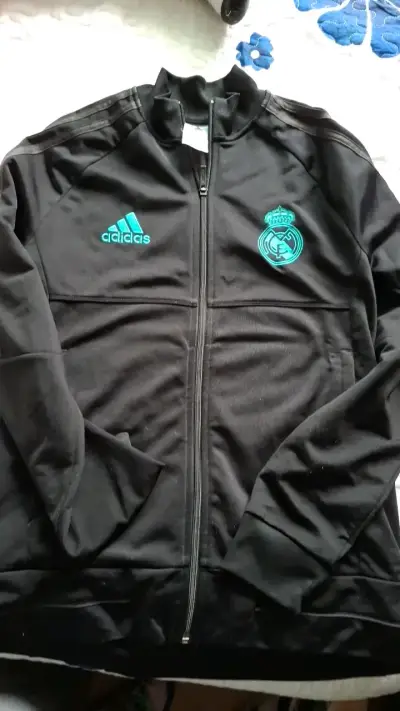 Chaqueta deportiva Adidas Real Madrid negra - miniatura 1