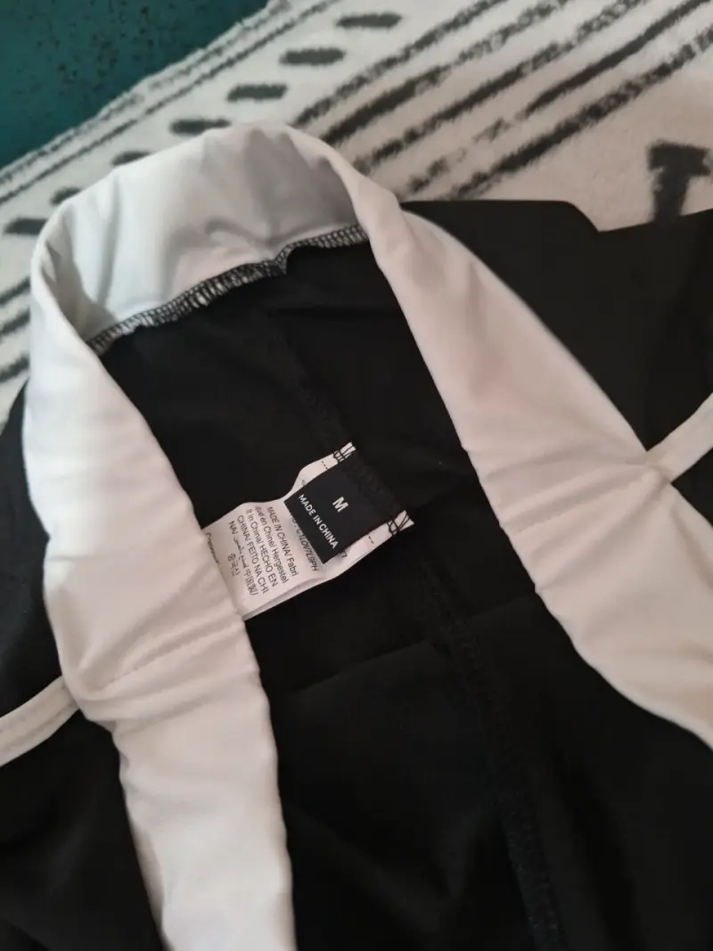 Pantalones deportivos negros con franjas blancas - 2
