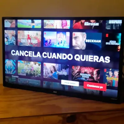 Smart TV AOC 32” con Netflix y YouTube + soporte - miniatura 1