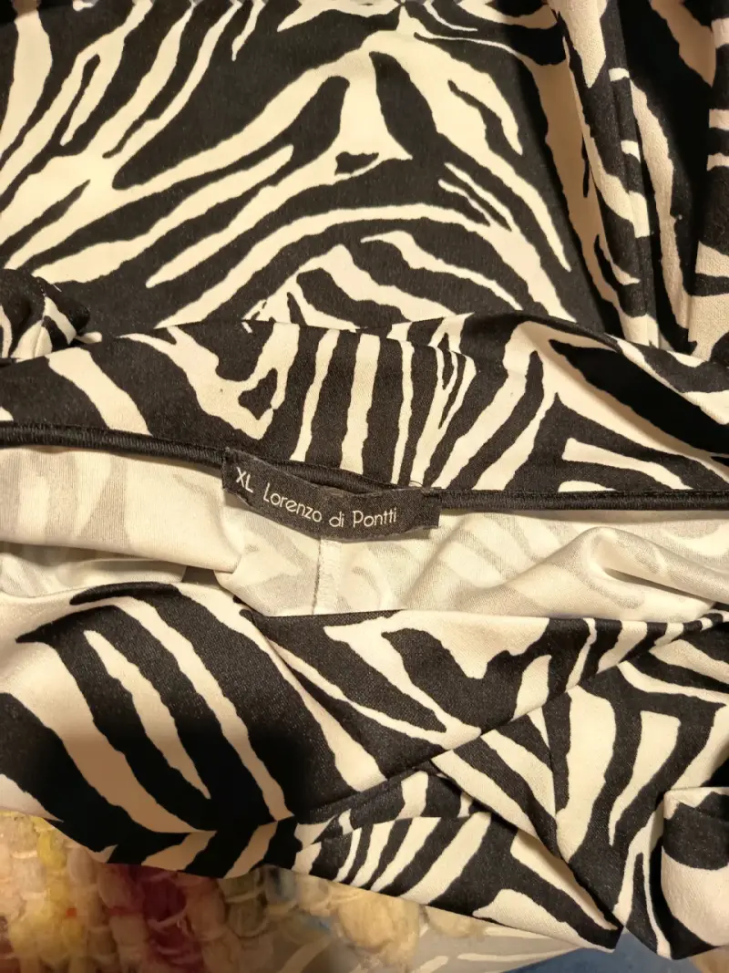 Pantalones acampanados con estampado de cebra - 6
