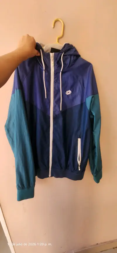 Cortaviento deportivo azul Lotto para hombre - miniatura 1