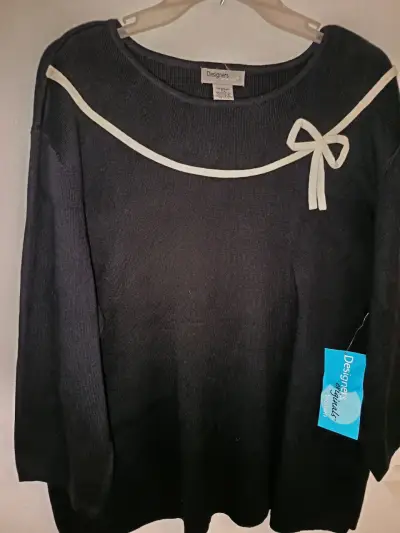 Suéter negro con lazo de la marca Designes Origina - miniatura 1