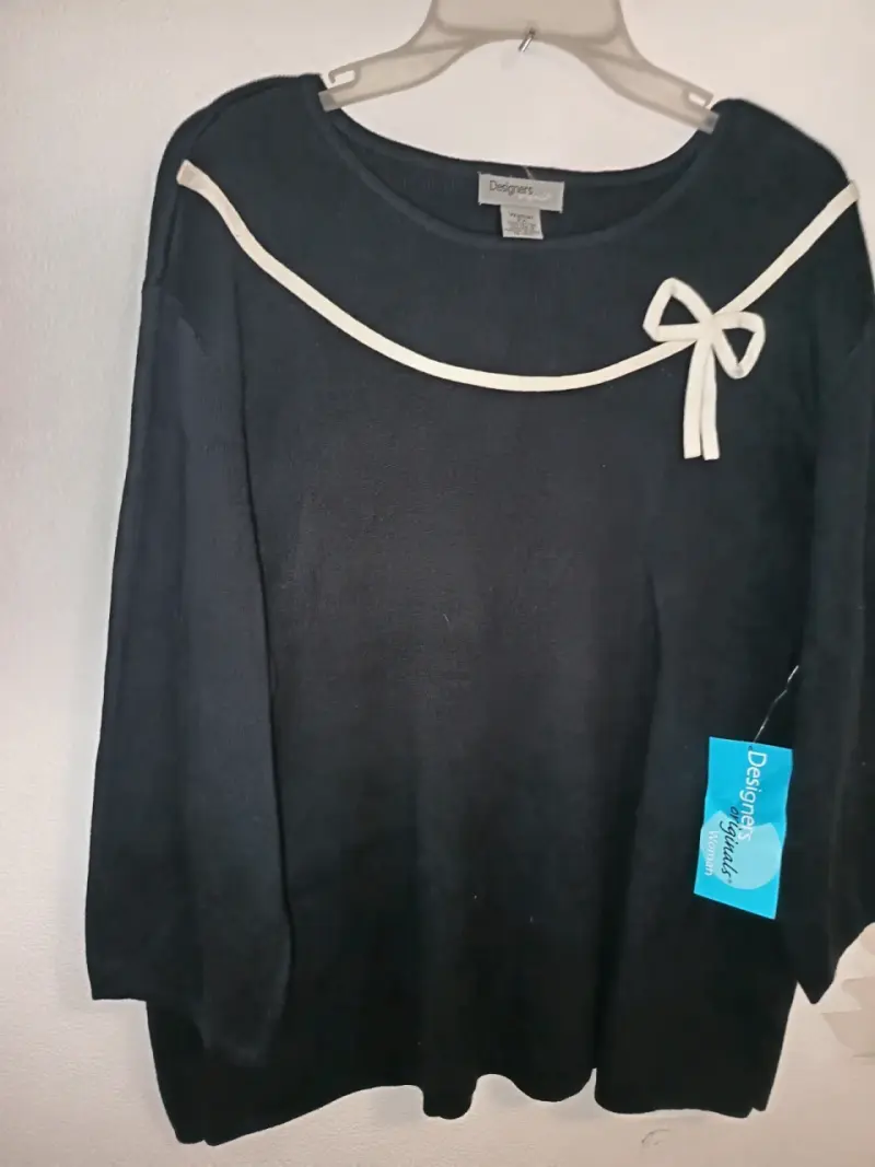 Suéter negro con lazo de la marca Designes Origina - 2