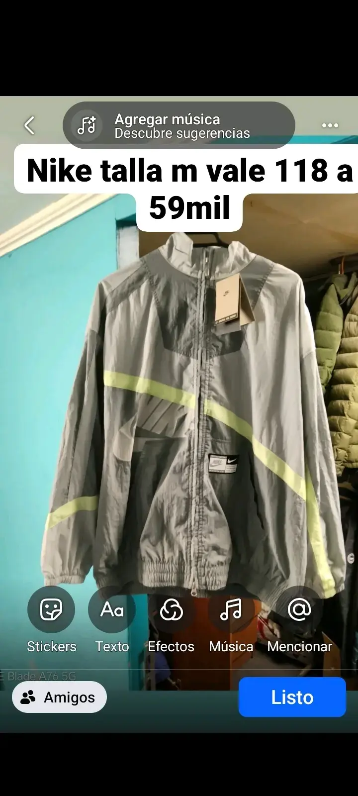Chaqueta Nike talla M gris con detalles reflectantes