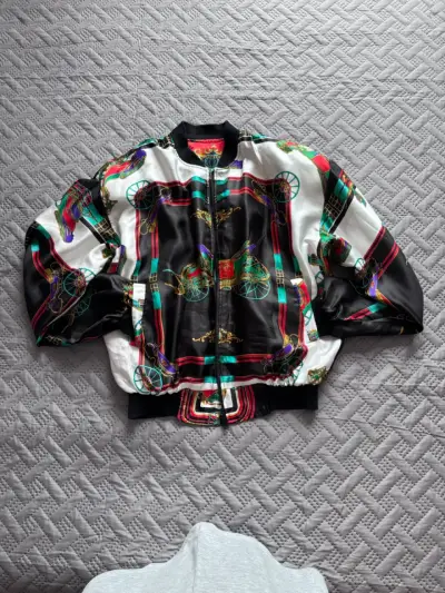 Chaqueta bomber reversible con diseño colorido - miniatura 1