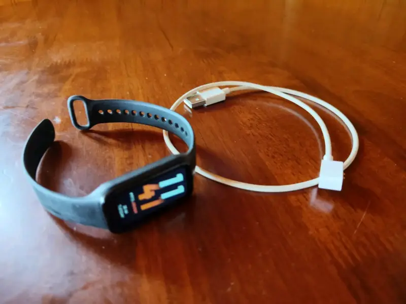 Reloj inteligente con pantalla táctil y cargador