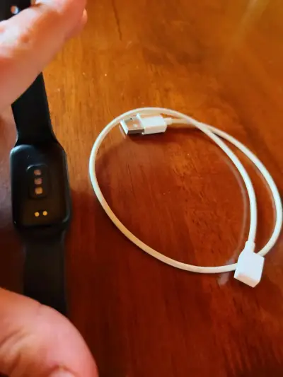 Reloj inteligente con pantalla táctil y cargador - miniatura 3