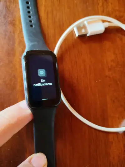 Reloj inteligente con pantalla táctil y cargador - miniatura 4