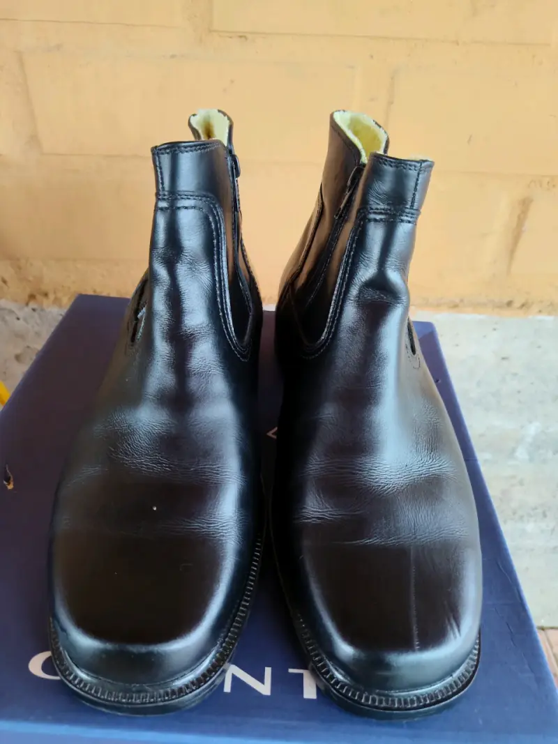 Botines de cuero negro con forro interior - 1