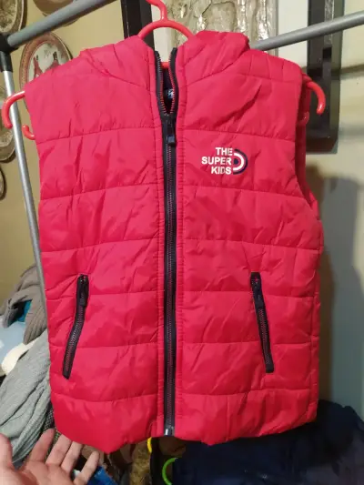 Chaleco acolchado reversible para niños - miniatura 3