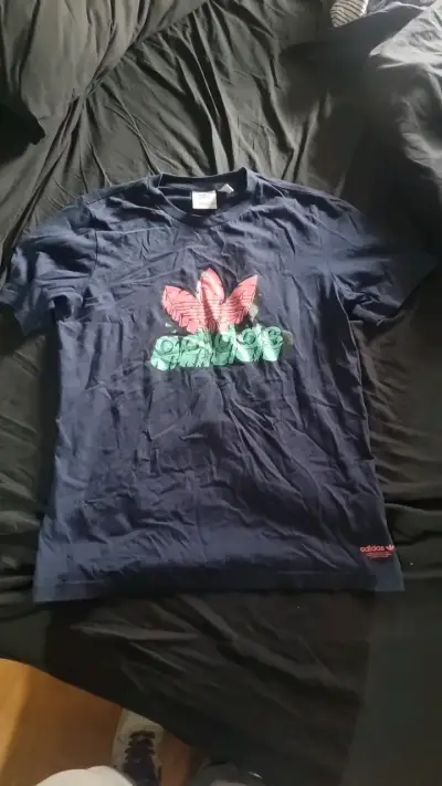 Polera Adidas azul con logo estampado - miniatura 1