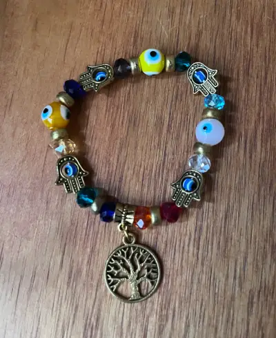 Pulsera de cuentas con dijes - miniatura 1