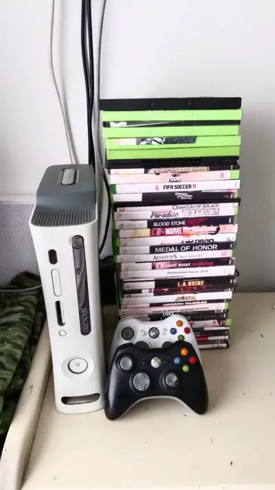 Consola Xbox 360 con juegos y controles - miniatura 1