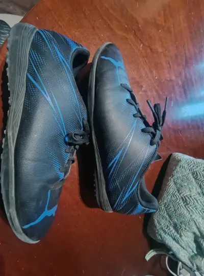 Zapatillas deportivas negras con detalles azules Puma - miniatura 1