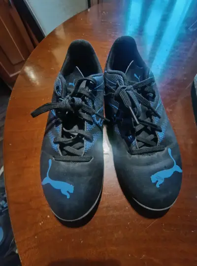 Zapatillas deportivas negras con detalles azules Puma - miniatura 2