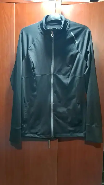 Chaqueta deportiva negra Under Armour - miniatura 1
