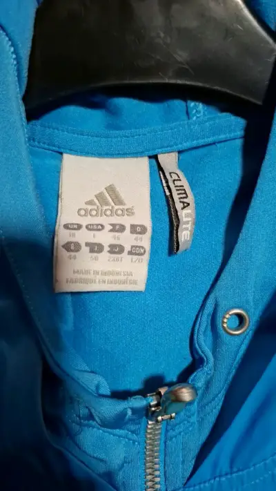Chaqueta deportiva celeste Adidas Climalite - miniatura 4