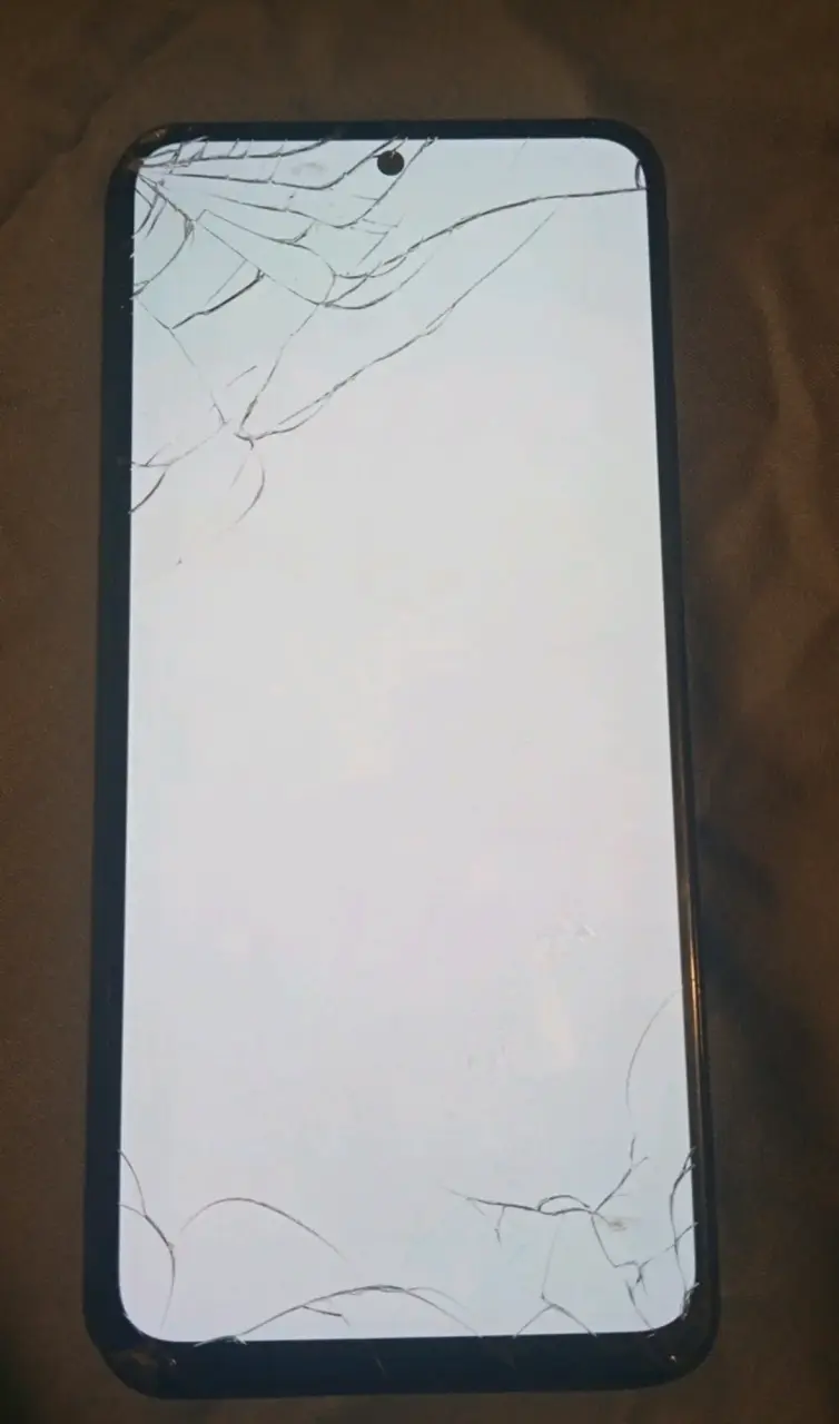 Teléfono Xiaomi Redmi con pantalla dañada - 2