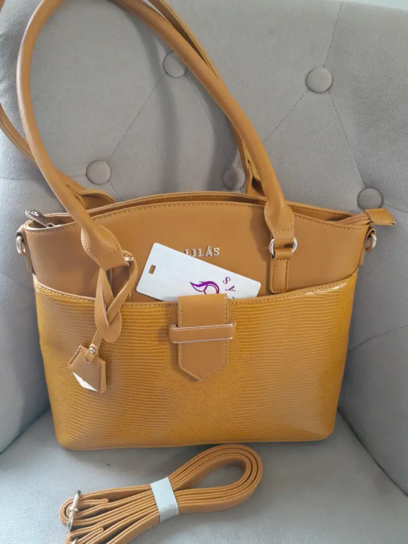 Bolso de mano color mostaza con correa ajustable - 2