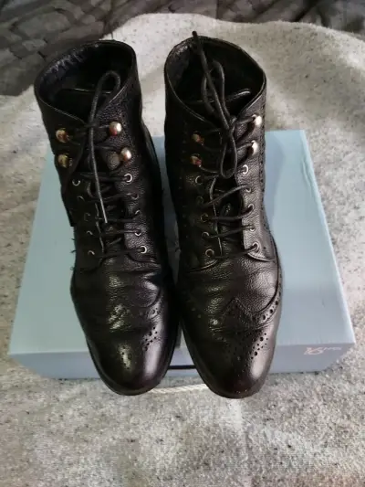 Botines de cuero negro para mujer con diseño elega - miniatura 1