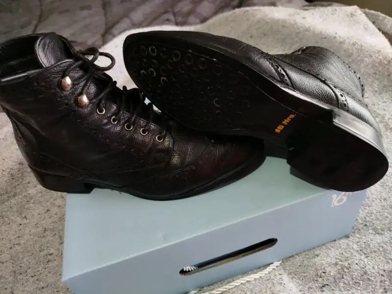 Botines de cuero negro para mujer con diseño elega - 2