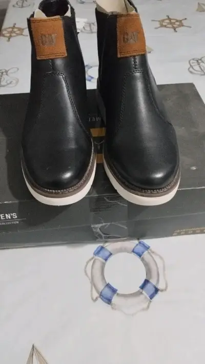 Botines de cuero negro para mujer CAT - miniatura 1