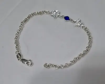 Pulsera de plata con dijes y piedras - miniatura 1