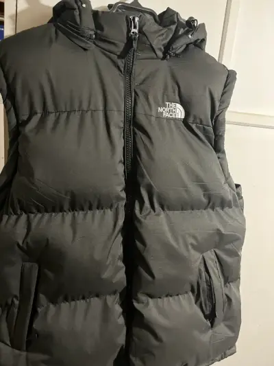 Chaleco The North Face negro con capucha - miniatura 1