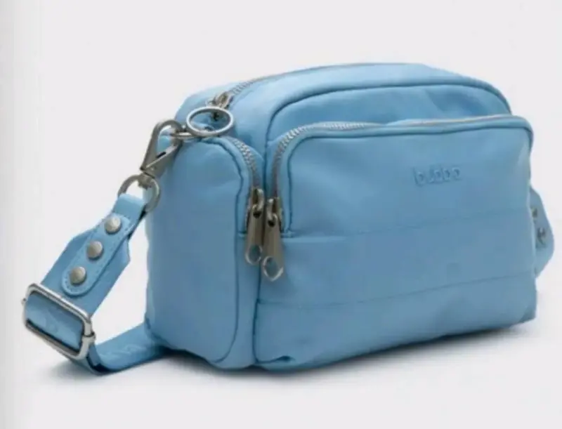 Bolso cruzado azul claro Bubba con múltiples compartimentos - 2