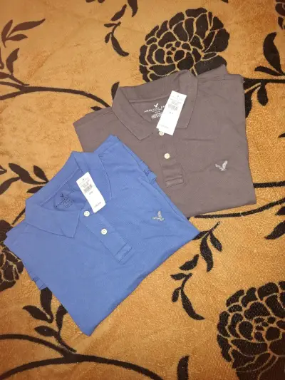 Poleras tipo polo American Eagle en azul y marrón - miniatura 1