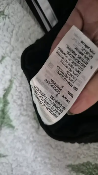 Pantalones deportivos negros Adidas con franjas blancas - miniatura 2
