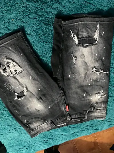Jeans rasgados de mezclilla para hombre - miniatura 2