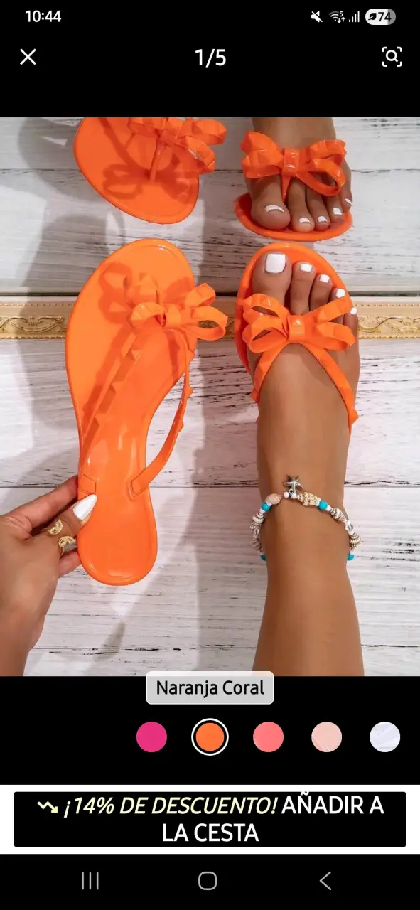 Sandalias planas naranjas con lazo