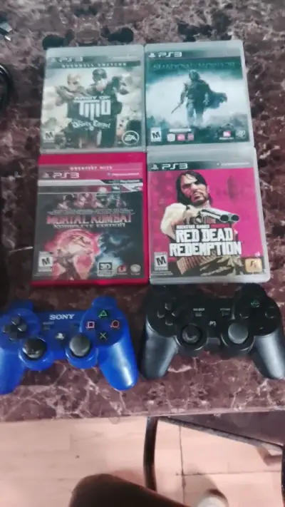 Consola PS3 con juegos y controles - miniatura 2