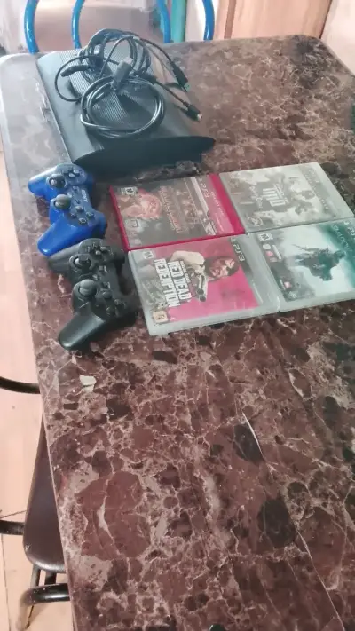 Consola PS3 con juegos y controles - miniatura 5