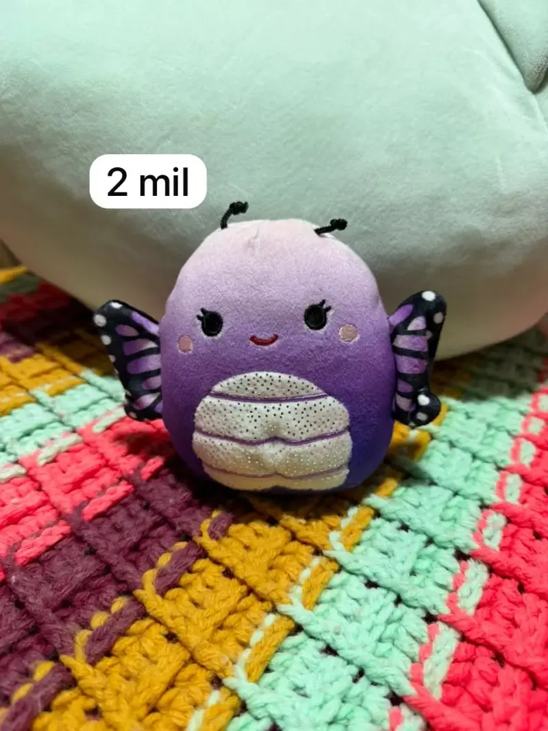 Peluche mariposa morado