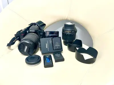 Cámara Nikon D5100 con 2 lentes y accesorios - miniatura 1