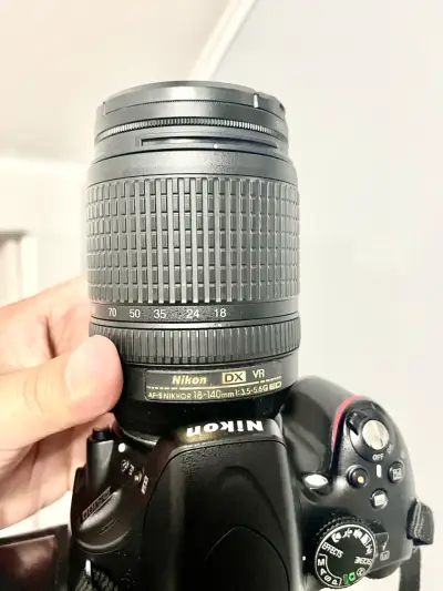 Cámara Nikon D5100 con 2 lentes y accesorios - miniatura 4