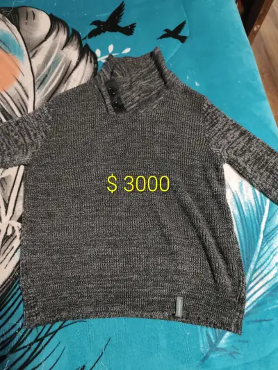 Suéter de lana gris con cuello alto - miniatura 1