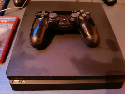 Play station 4 slim - miniatura 1