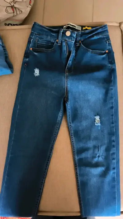 Jeans azul desgastados para mujer - miniatura 1