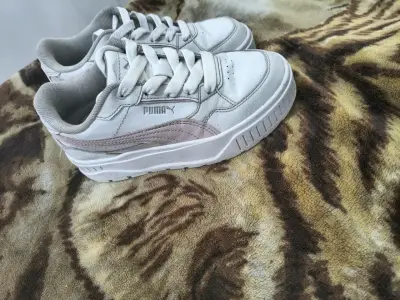 Zapatillas deportivas blancas Puma para mujer - miniatura 1