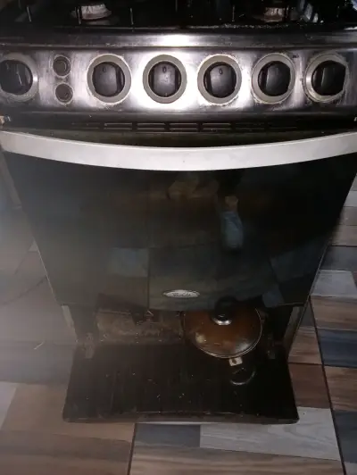 Cocina a gas Whirlpool con horno - miniatura 1