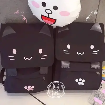 Mochila negra con diseño de gato kawaii - miniatura 2