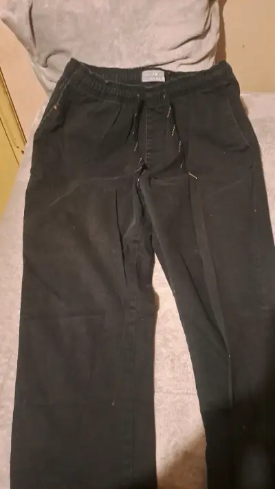 Pantalones negros casuales para hombre - miniatura 1